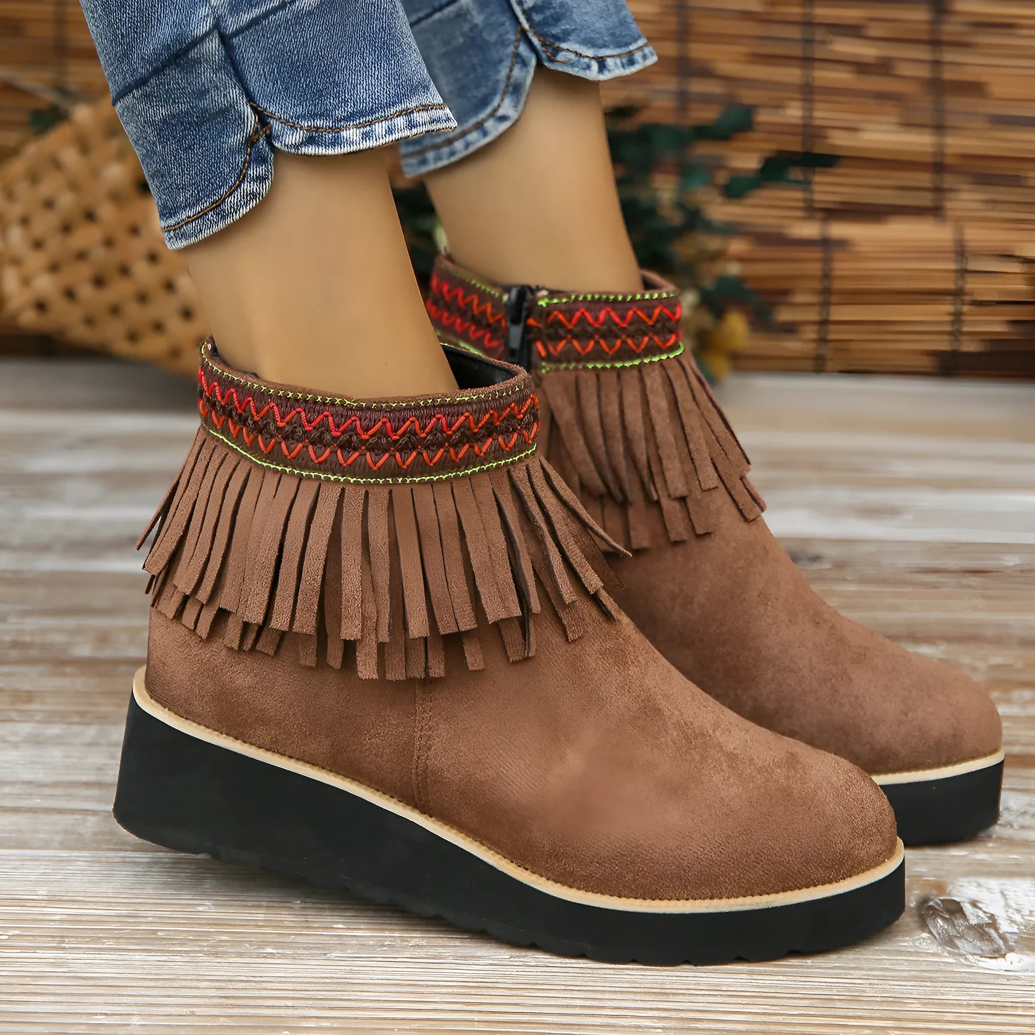 Women's black suede wedge bootie with thick platform sole and side zip.
