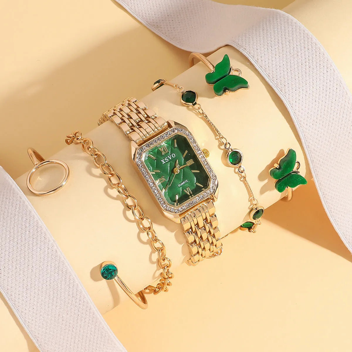 Gold green square women's watch with four matching butterfly bracelets in jewellery gift set