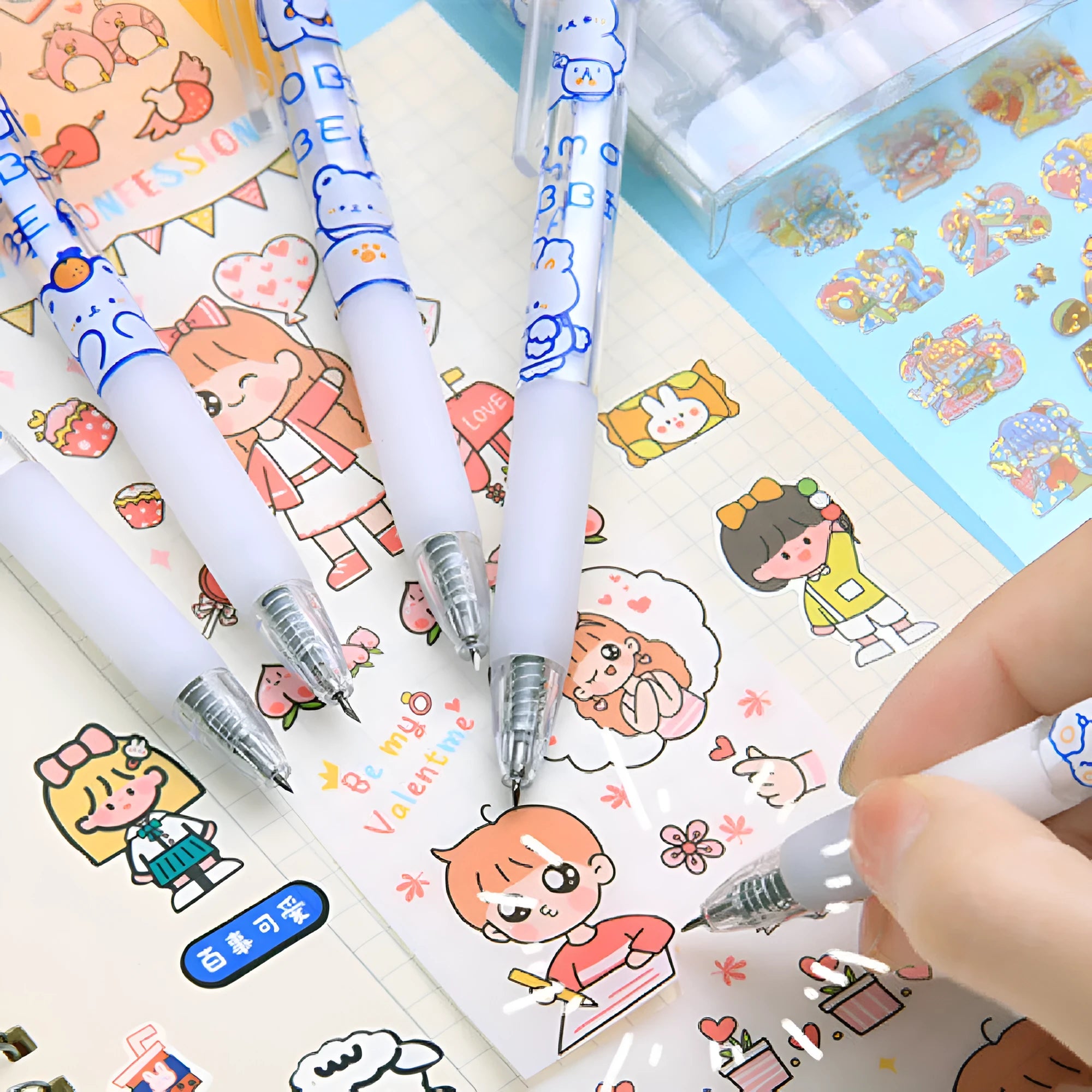 Set of six colourful bear and rabbit themed press pen knives on a white background.