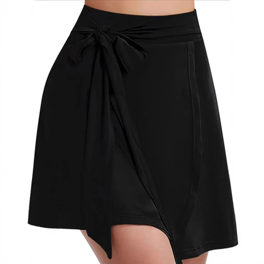 Black thigh-length sports skirt with built-in shorts, shown with high waist and casual Japanese Korean style details.