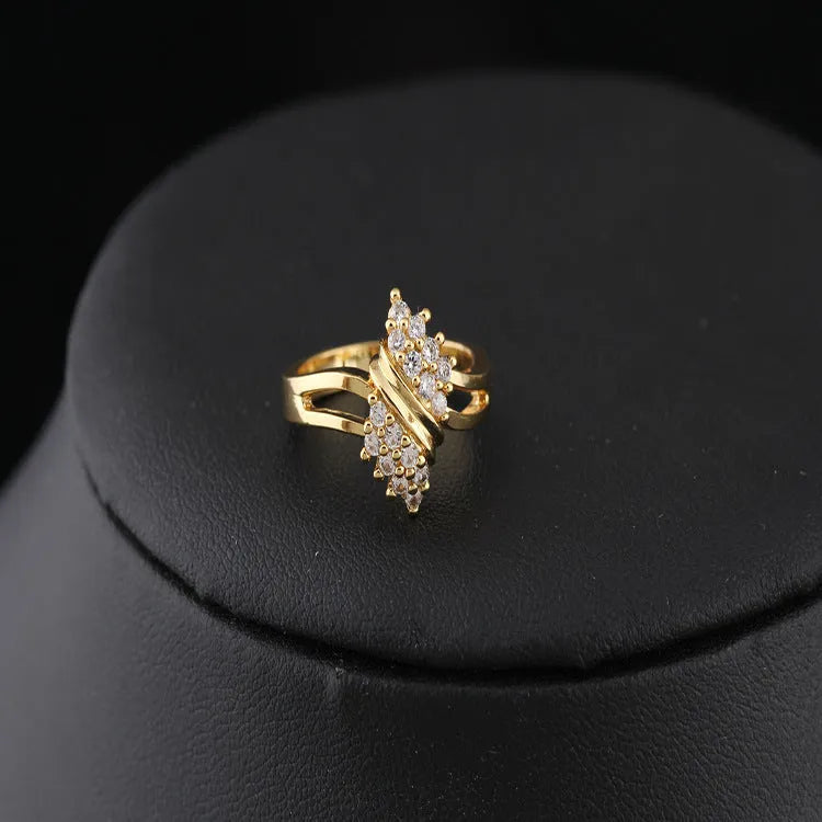 Girls fashion Korean style gold-coloured copper zircon ring on white background