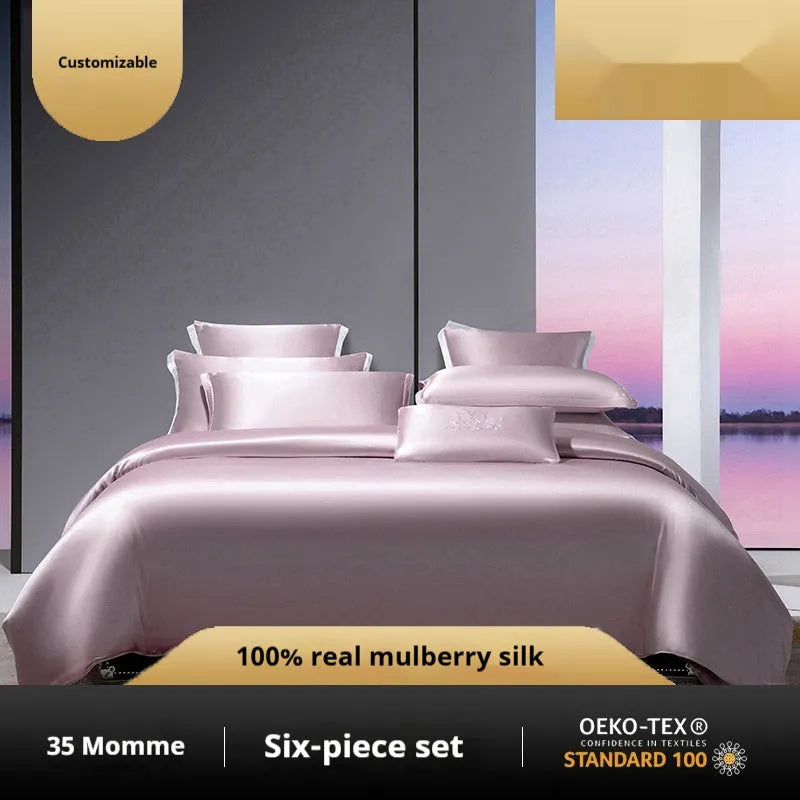 Silk four-piece bed set in a solid colour showing duvet cover and matching pillowcases.
