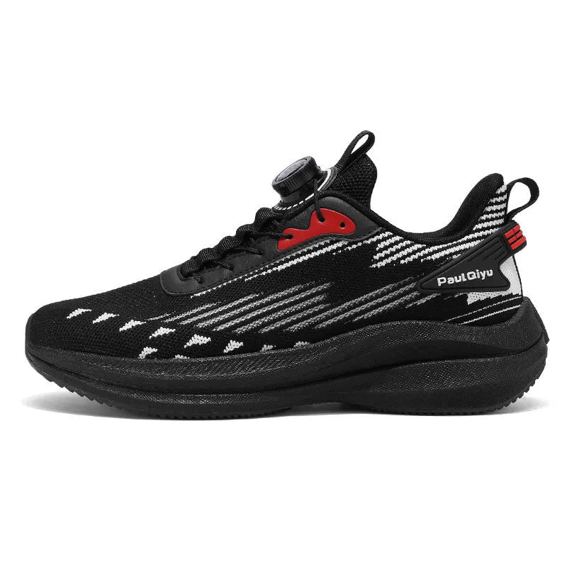 Men's black casual running shoes with a rotating buckle closure and fly-knit mesh upper on a flat TPU sole.