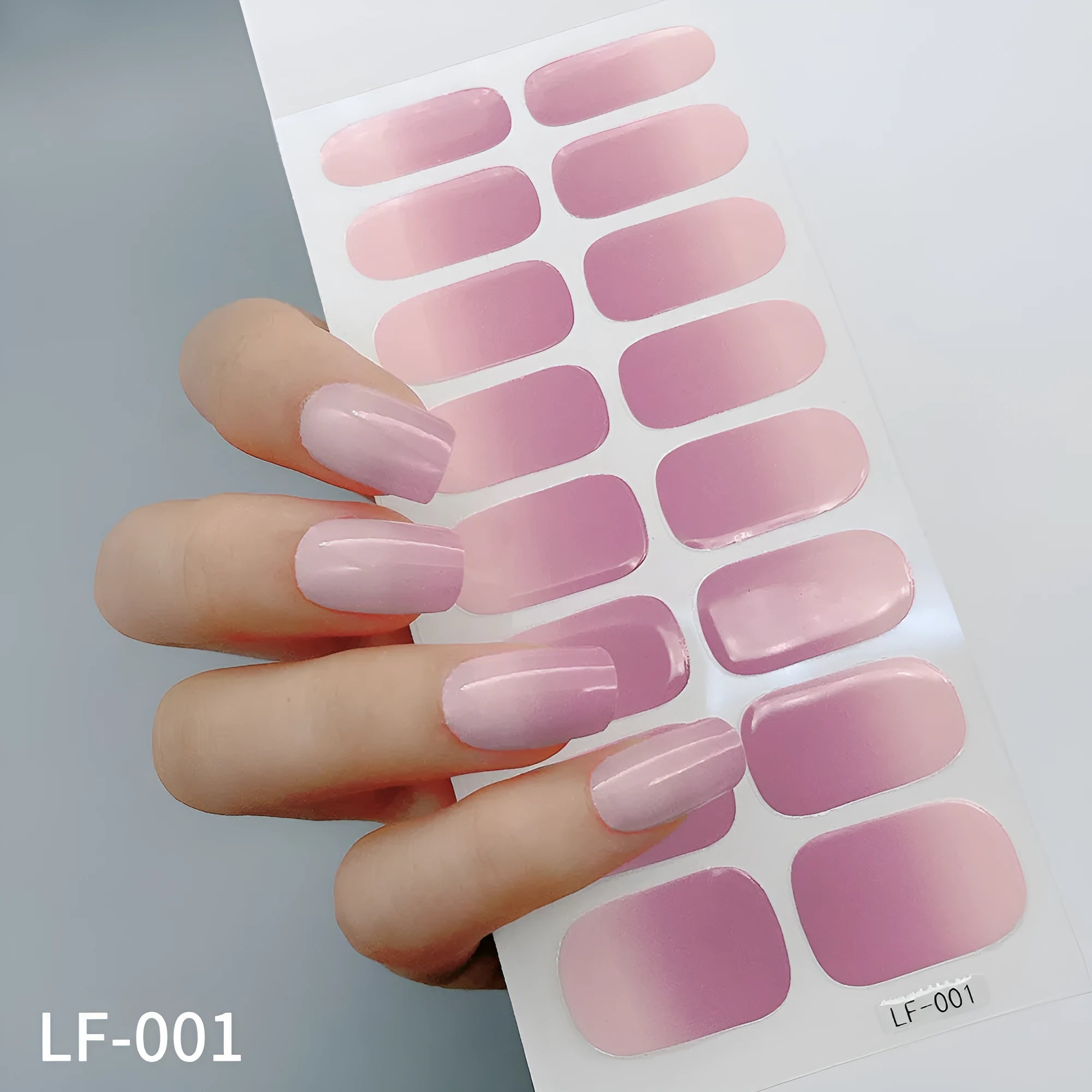 16 solid colour full nail art stickers with 22 patterns including cross, rose, butterfly designs in 12x6mm oval size