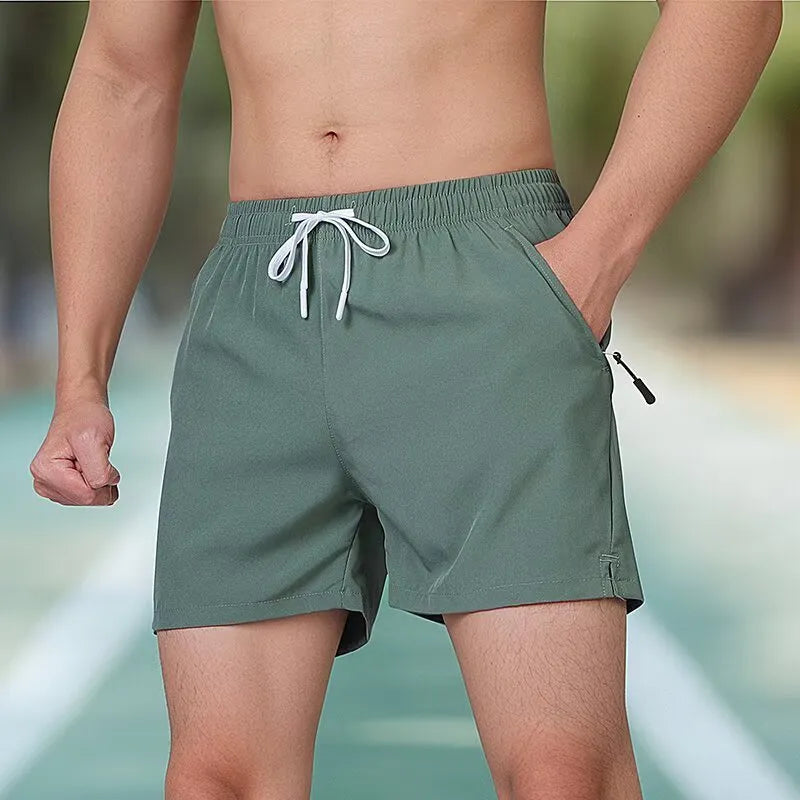 Men's black high-waist polyester fitness training shorts with a drawstring waist.
