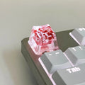 Transparent resin starry sky keycap with glitter particles in red, pink, green, violet colours for mechanical keyboards