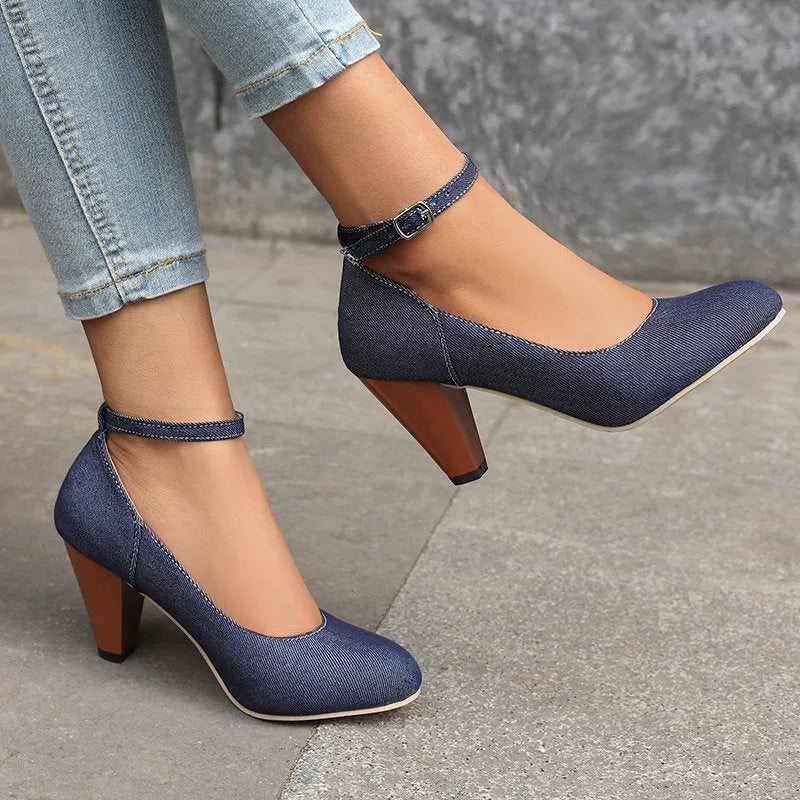 Blue denim women's high heel ankle boots with a buckle strap and thick waterproof platform sole.