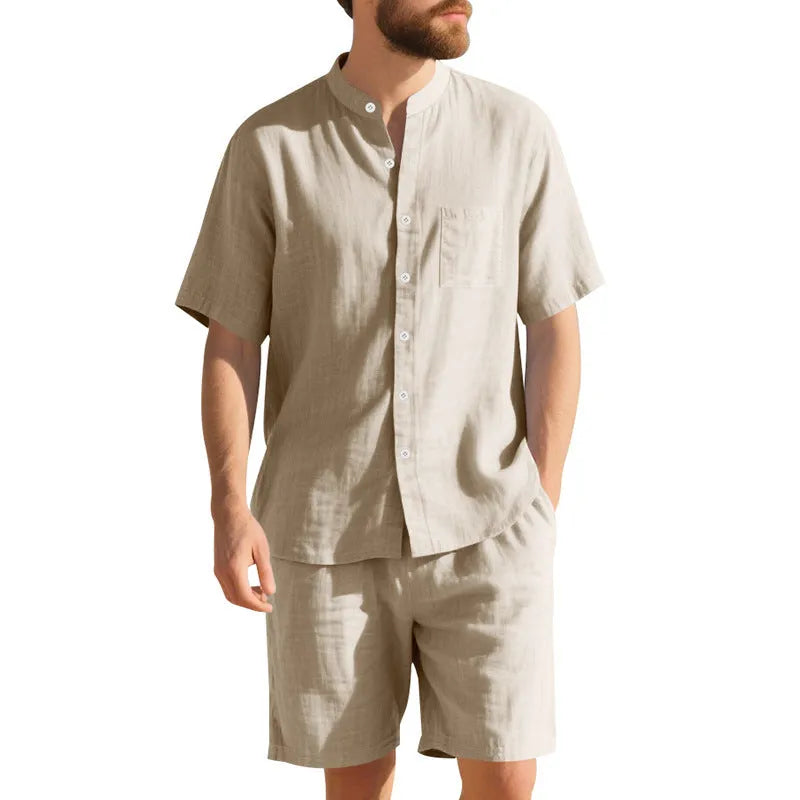 Men's light blue linen blend summer suit with henry collar shirt and shorts on a hanger.