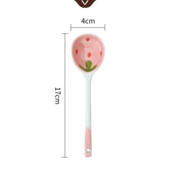 Strawberry-themed porcelain dinnerware set with plates, flower bowls, and microwave-safe spoons