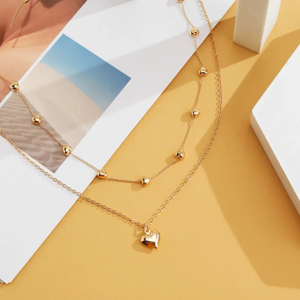 Double-layer gold tone alloy heart pendant curb chain necklace on woman, 51-80cm adjustable length