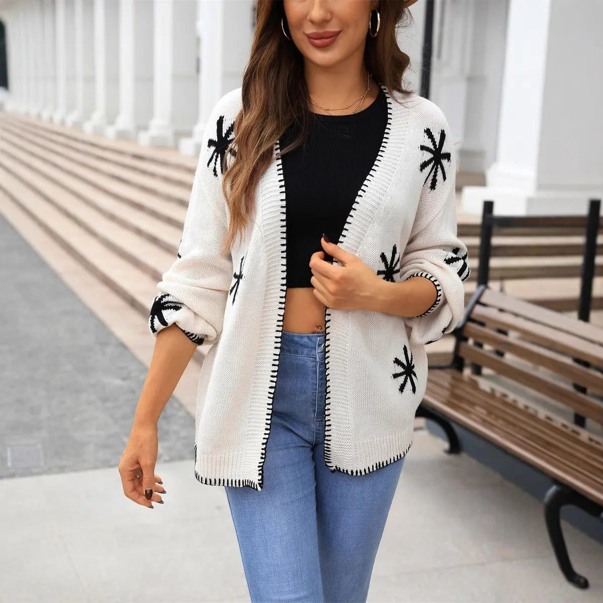 Beige plus-size women's cardigan with white Jacquard flower pattern, loose fit and off-neck design.