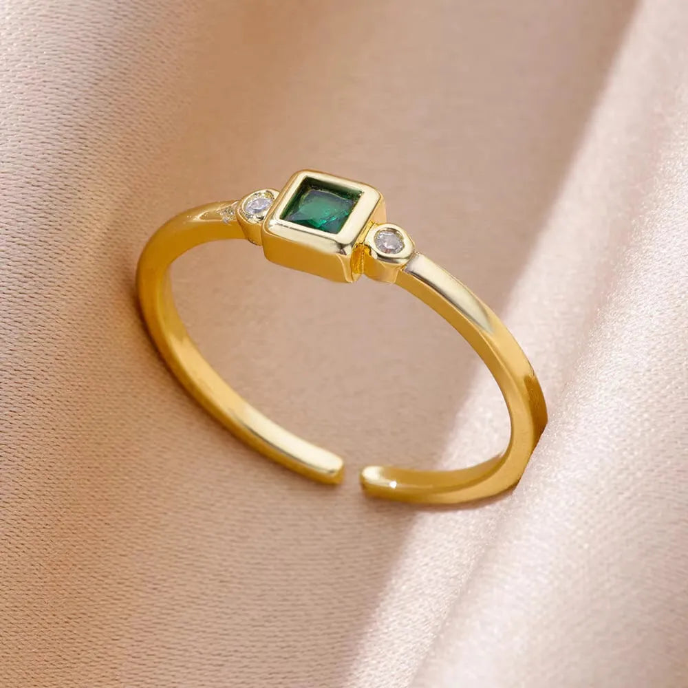 18K gold plated copper open mouth ring with synthetic zircon love emerald motif on white background