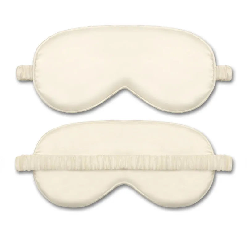 Rayon satin double-sided sleep mask in a selection of solid colours on a white background.