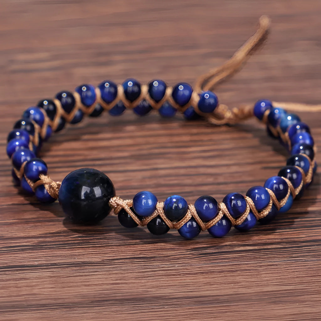 Handmade woven geometric pull bracelet in Tigereye stone showing blue and amethyst colour options