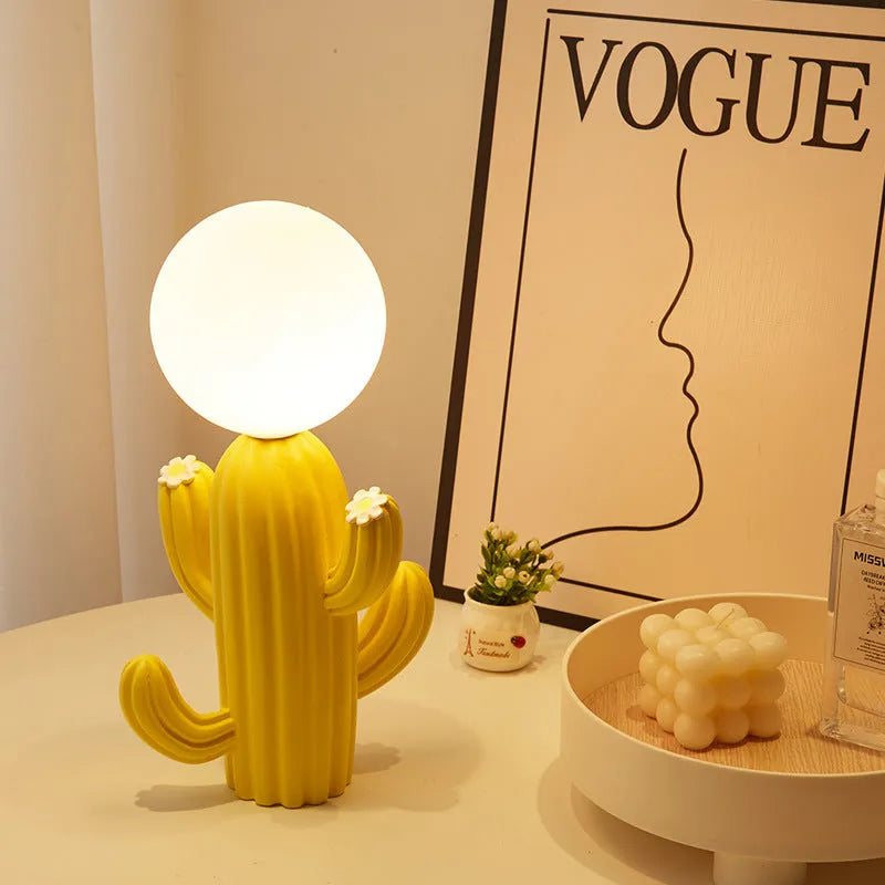 Green cactus button 3W plug-in bedside lamp on a modern nightstand