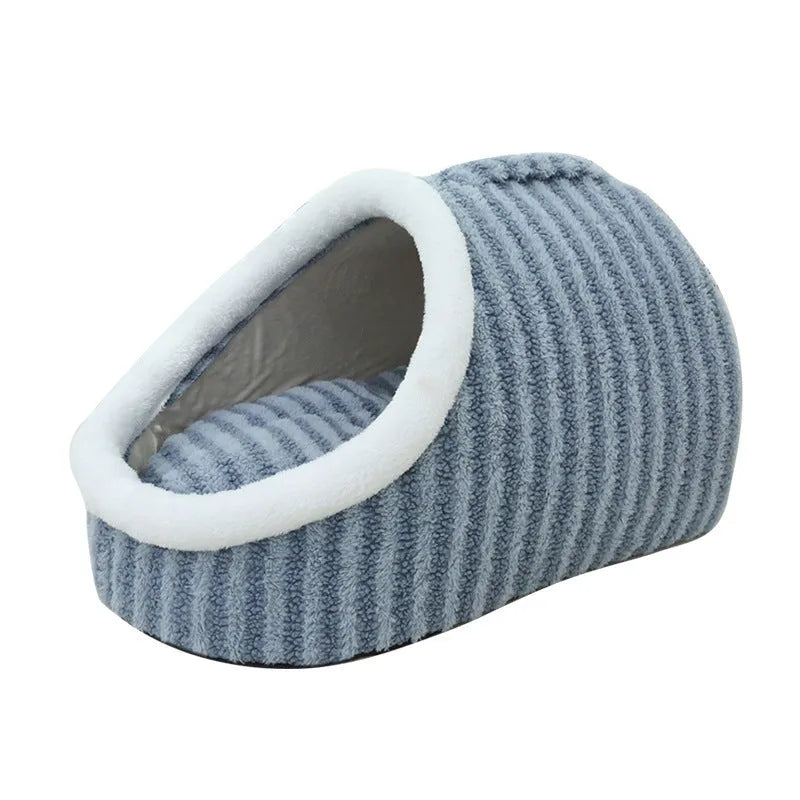 Macaron-shaped cat bed in blue colour, showing three-dimensional design with cloth material