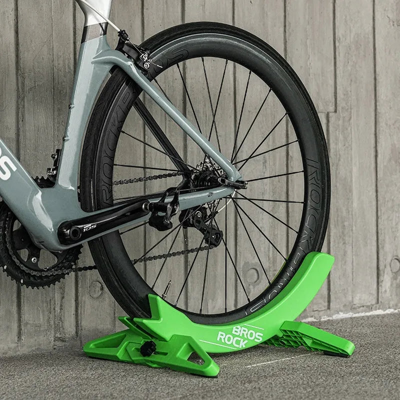 Black and green bicycle wall mount parking rack for mountain and road bikes