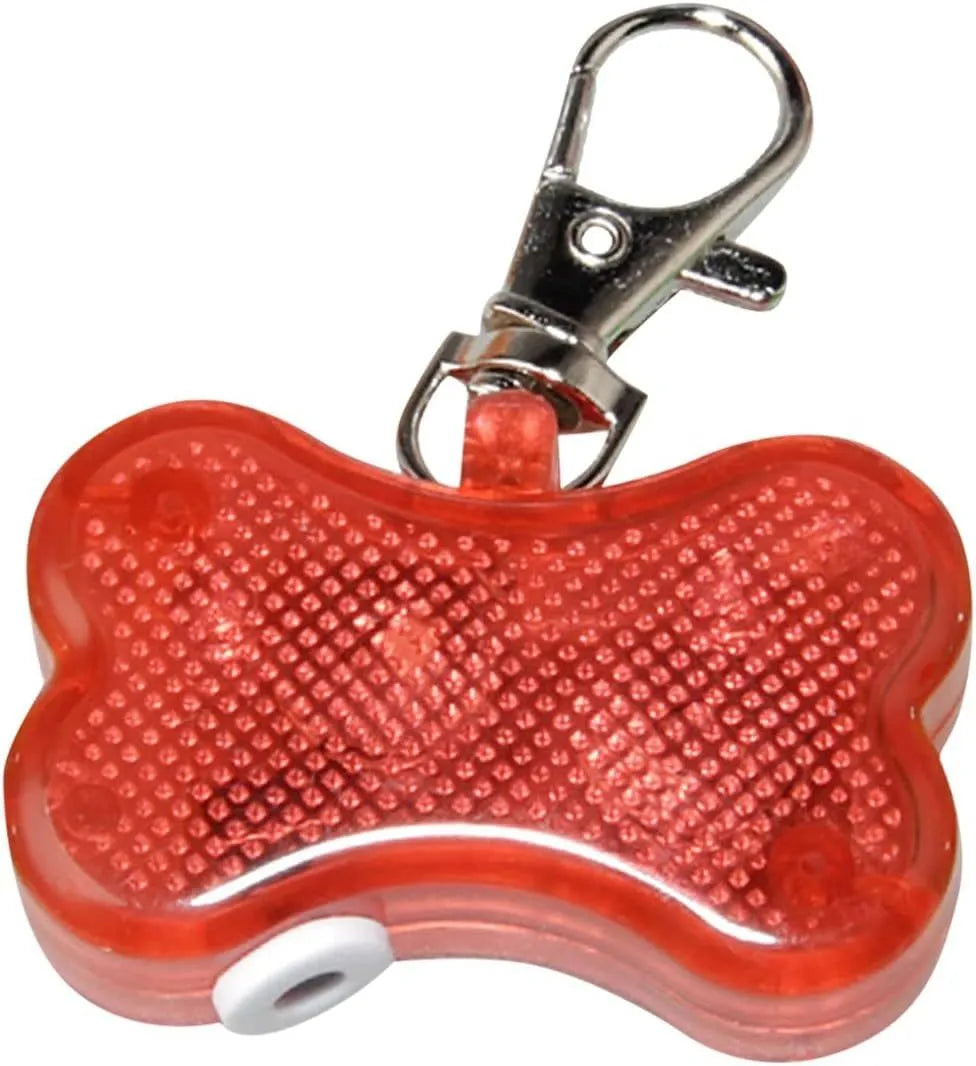 Blue bone-shaped LED glow pendant attached to a dog collar, showing flashing light.