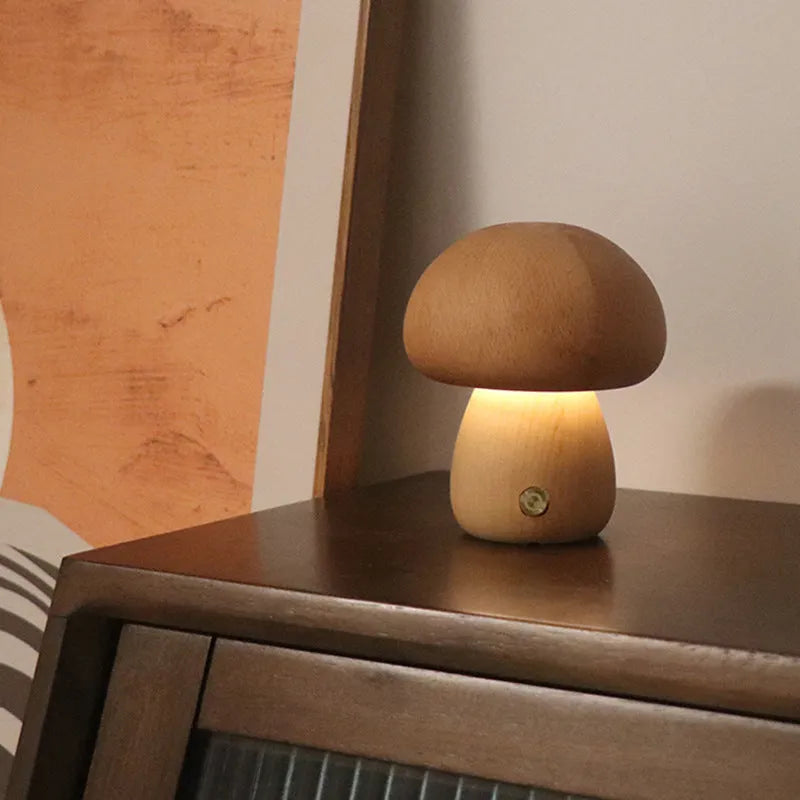 Wooden mushroom-shaped LED night light with touch switch on a bedside table, beech finish, 165 x 100 mm