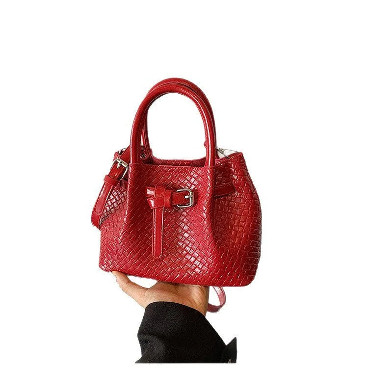 Soft PU bucket messenger handbag for women with spliced exterior and outer pocket, black colour option