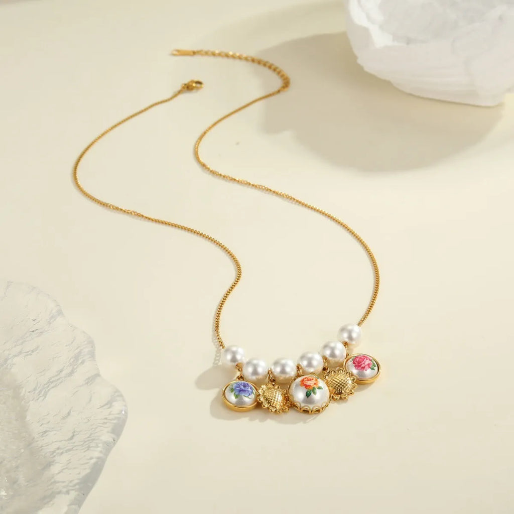Vintage sunflower stainless steel necklace with 18K gold electroplating, pendant on display, two colour variants available