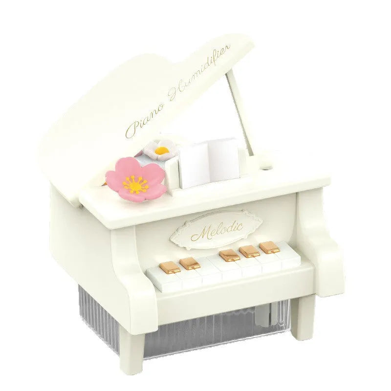 Small square plastic ultrasonic aroma diffuser in pink, USB powered, with built-in battery and timer