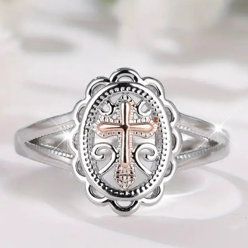 Women's silver cross lace fashion ring showing intricate pattern detail on alloy band