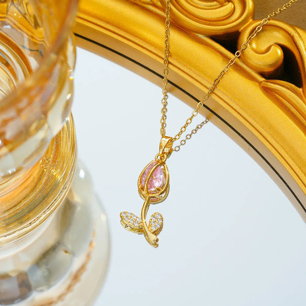 Gold-toned tulip flower zircon pendant on an adjustable O-ring chain necklace for women.