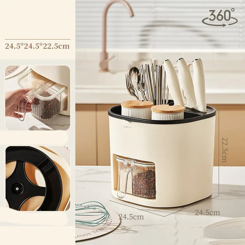 Plastic 360-degree rotating kitchen storage organiser with four compartments holding cutlery and a spice box
