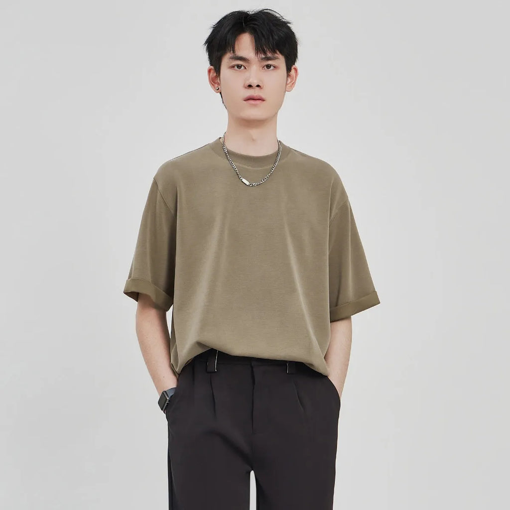 Men's brown loose drape knit casual T-shirt with short sleeves on a hanger.