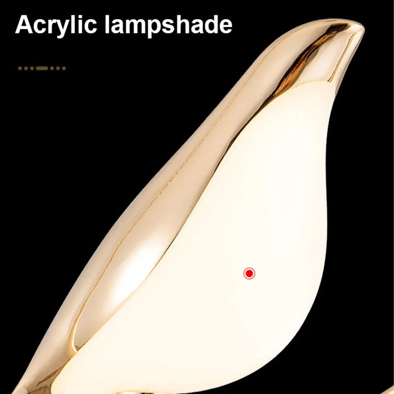 Tall, linear modern magpie bird chandelier with zinc alloy frame and acrylic details, hanging at 150cm.