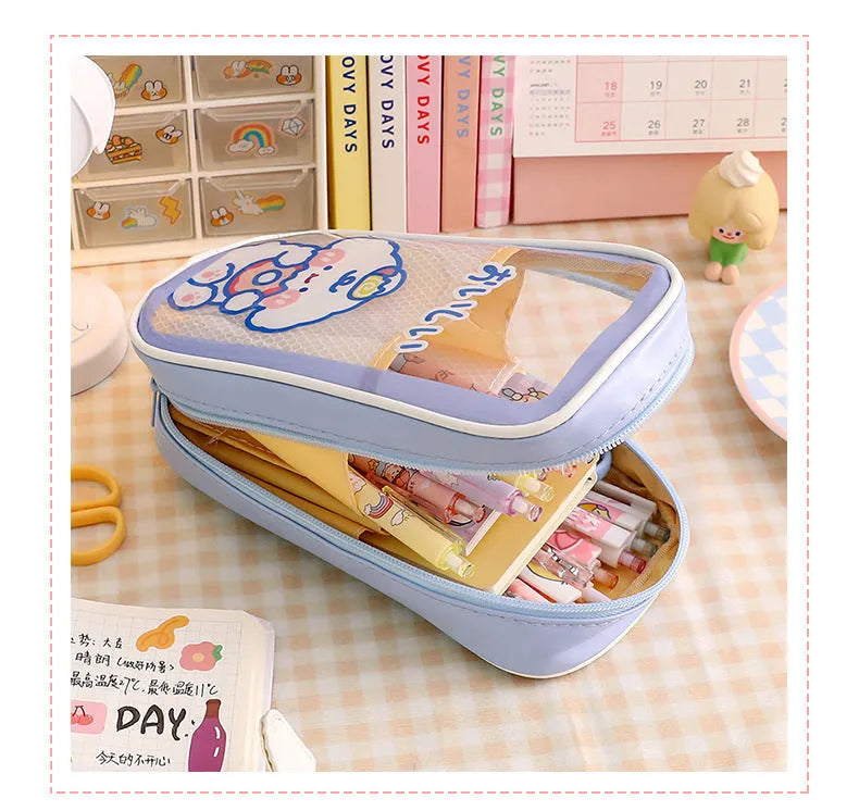 Transparent PVC pencil case with large capacity, featuring a cute Korean-style cartoon bear design.