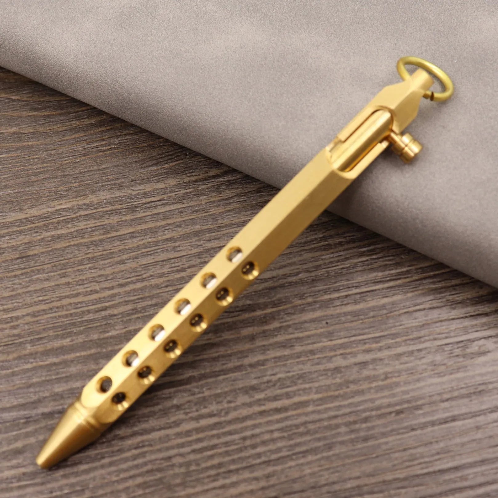 Brass tactical pen with retro colour finish and press mechanism