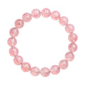 Geometric strawberry quartz crystal beads bracelet in natural white water colour on a wrist.