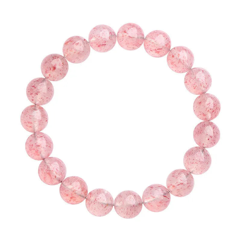 Geometric strawberry quartz crystal beads bracelet in natural white water colour on a wrist.