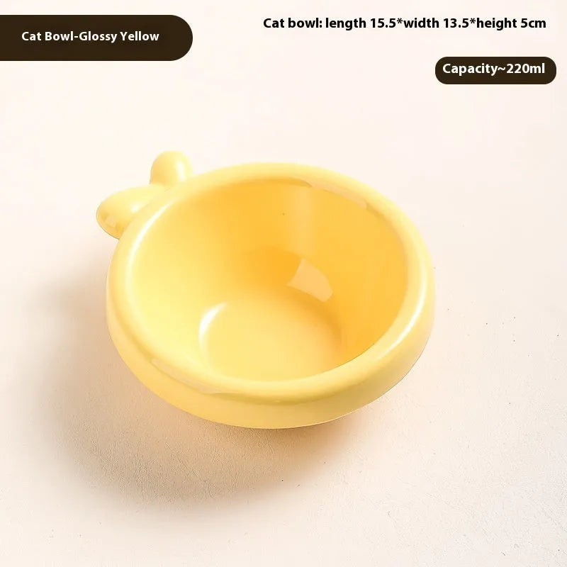 Porcelain cat drinking water bowl in bright red single grid configuration on surface