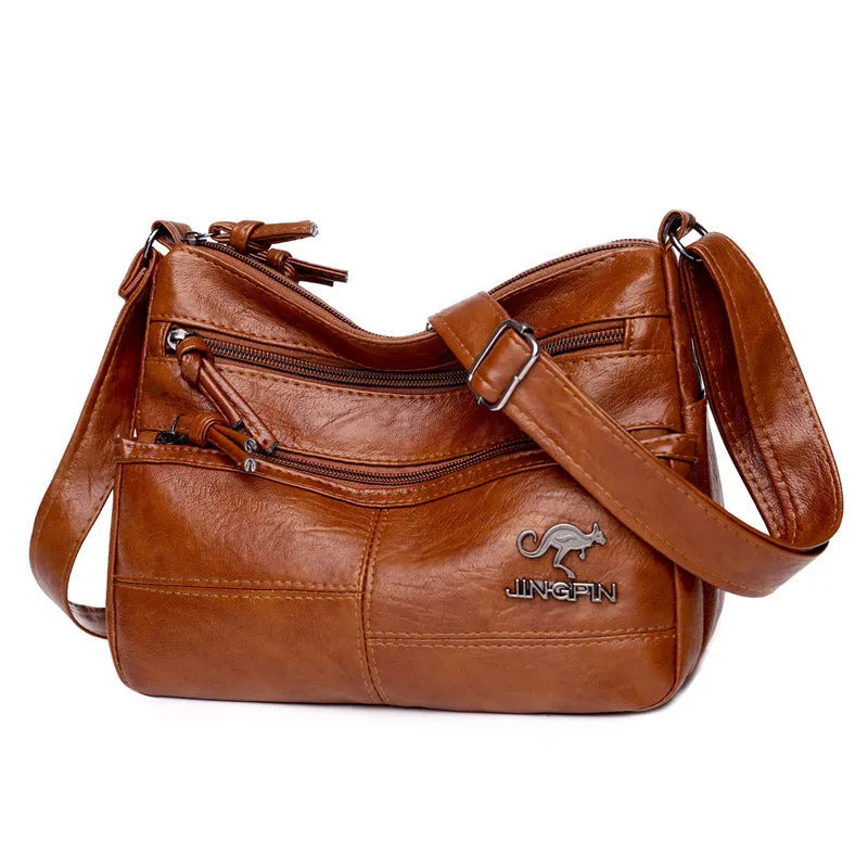 Crossbody shoulder bag in soft textured PU, black, 25x17x9cm, with sandwich pocket