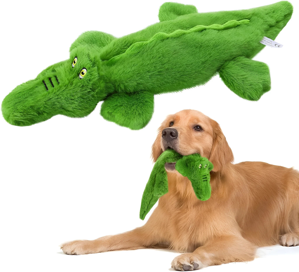 Green crocodile plush dog toy with squeaker and crinkle paper tail on a white background.