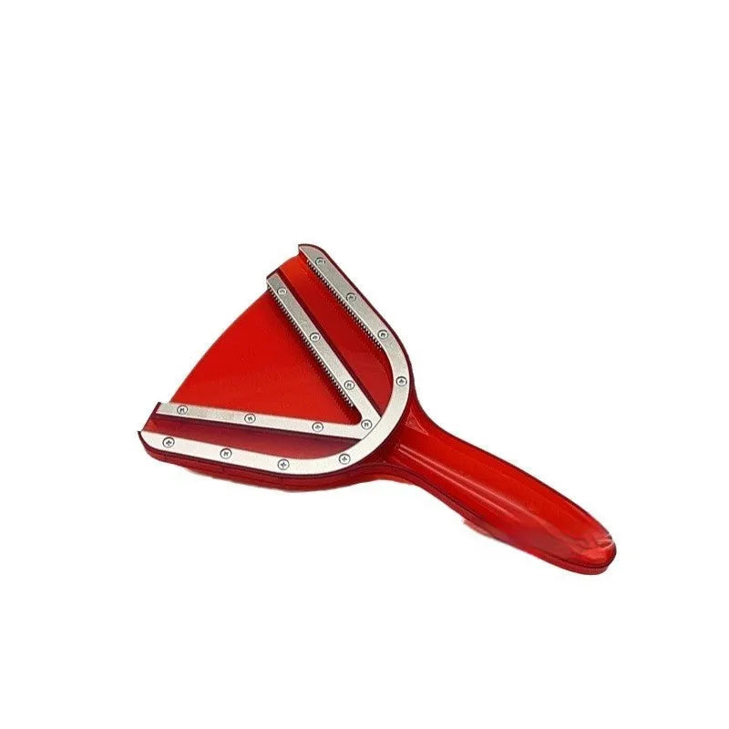 Red adjustable telescopic can and bottle opener with non-slip handle on a kitchen counter.