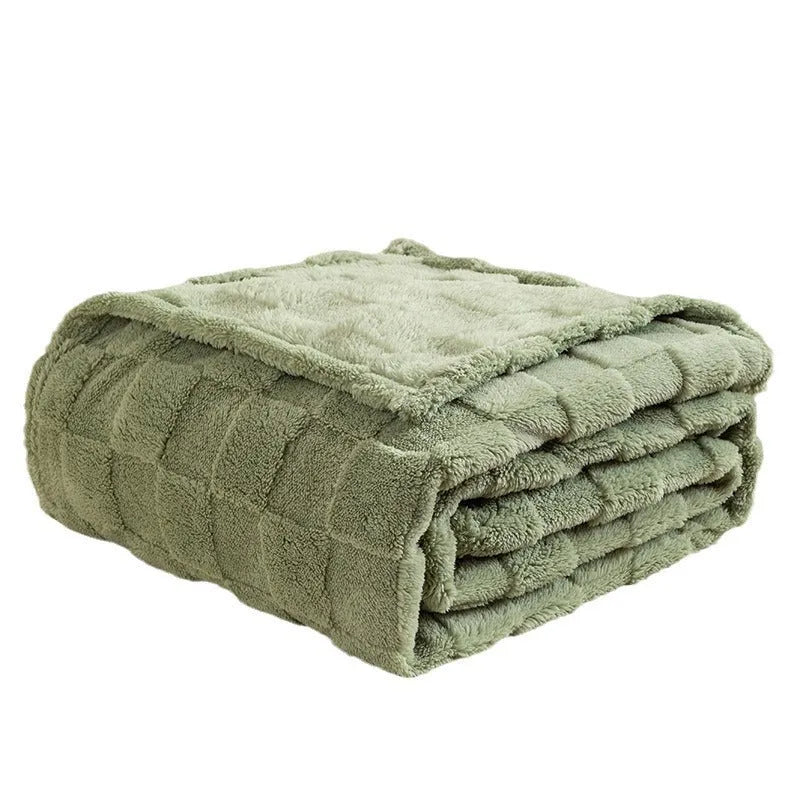 Geometric pattern polyester blanket in lake blue colour showing thickened texture