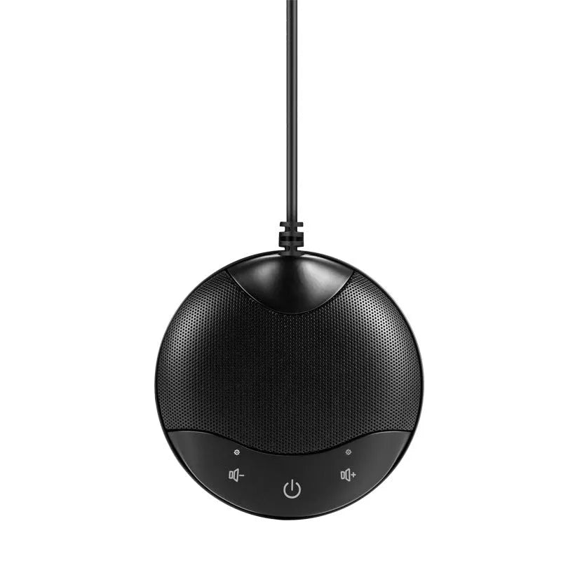 Black USB condenser microphone for conferences and gaming on a desk.