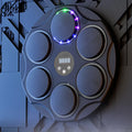 Smart Bluetooth boxing target with LED coloured lights mounted on wall for fitness training