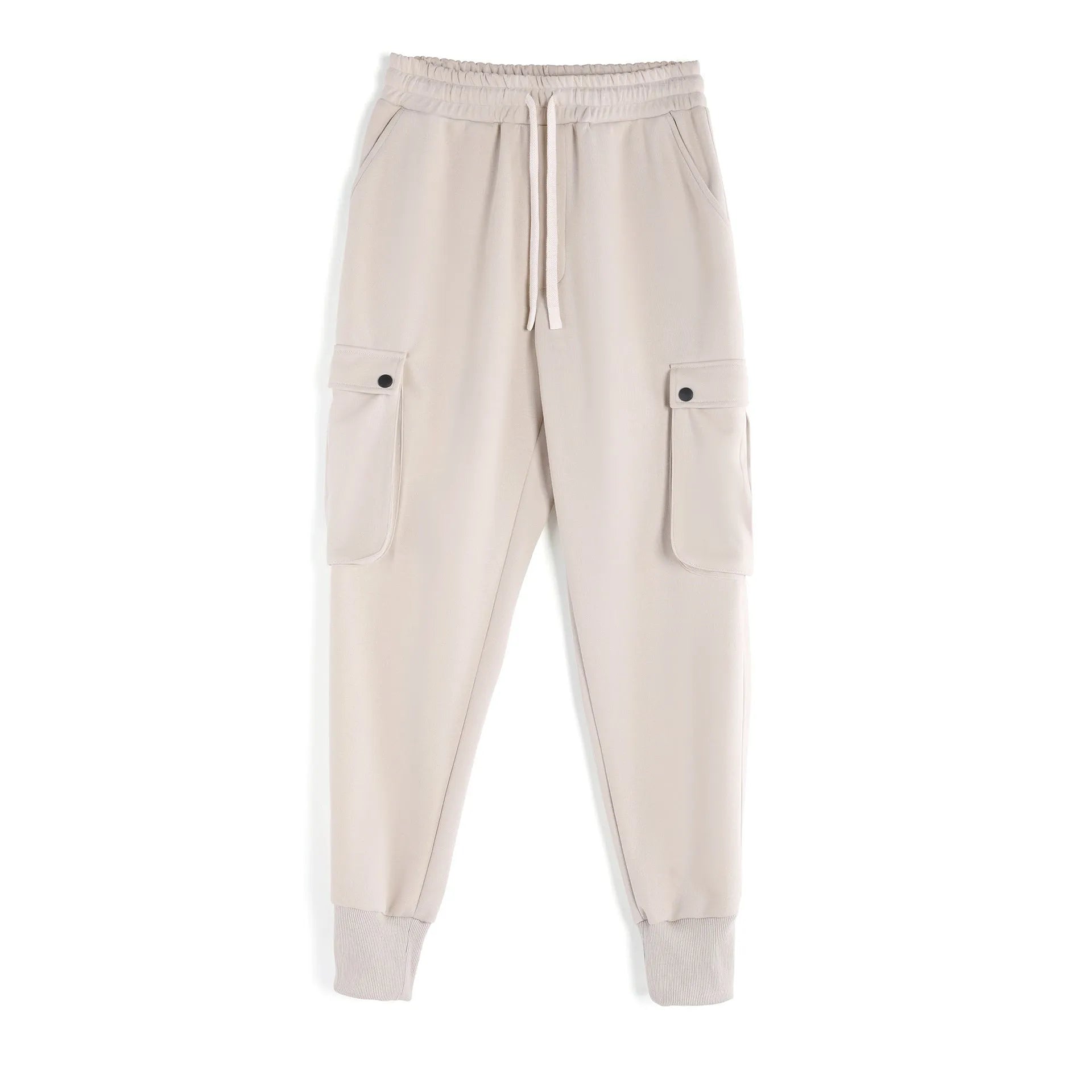 Men's beige ankle-tie loose-fit casual cotton trousers with side pockets on a neutral background.