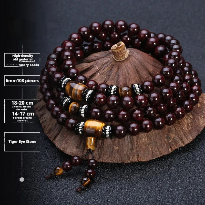 Men's rosewood prayer bead bracelet with 108 beads shown in a turquoise style variant.