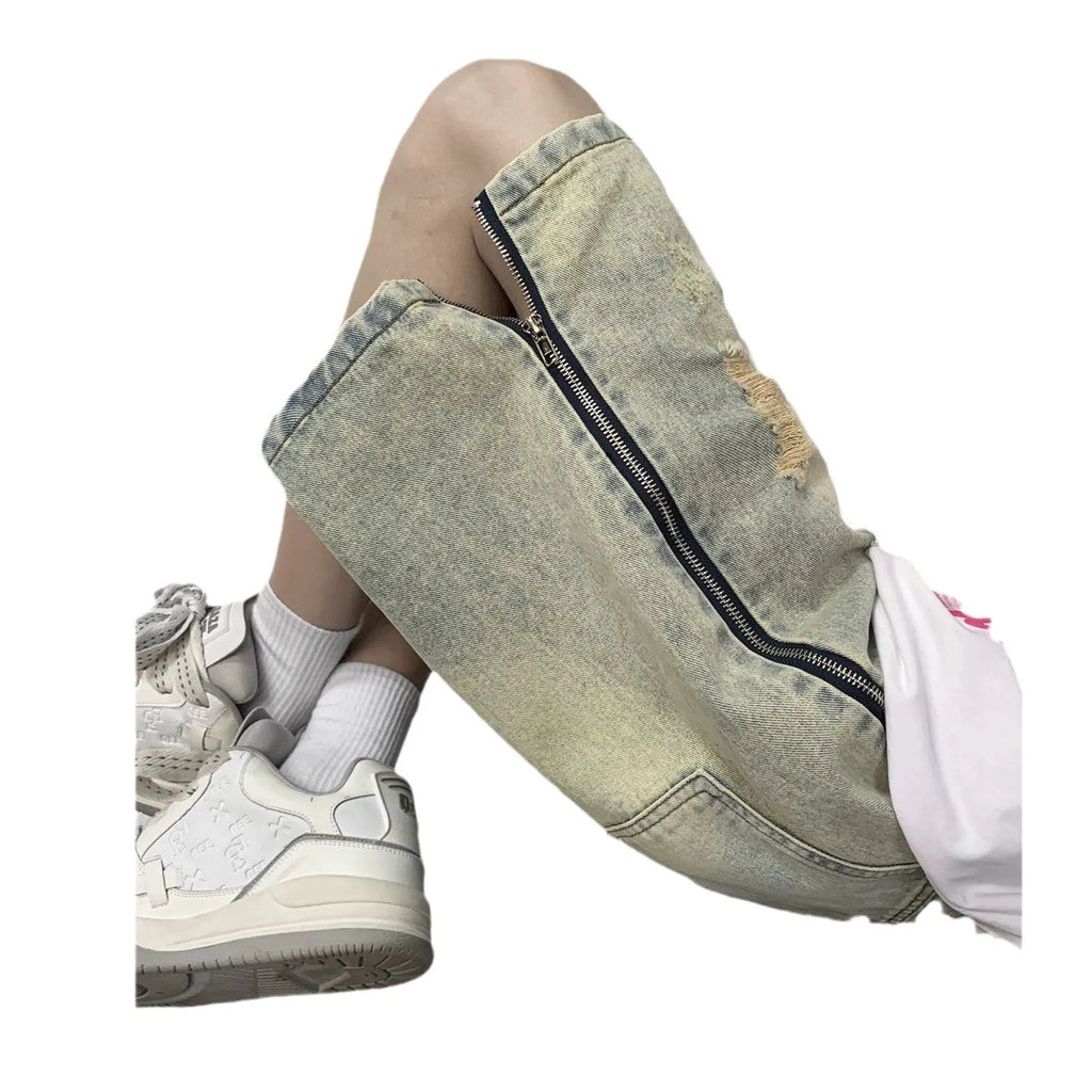 Men's blue retro denim shorts with five-point ripped distressing and yellow mud wash finish