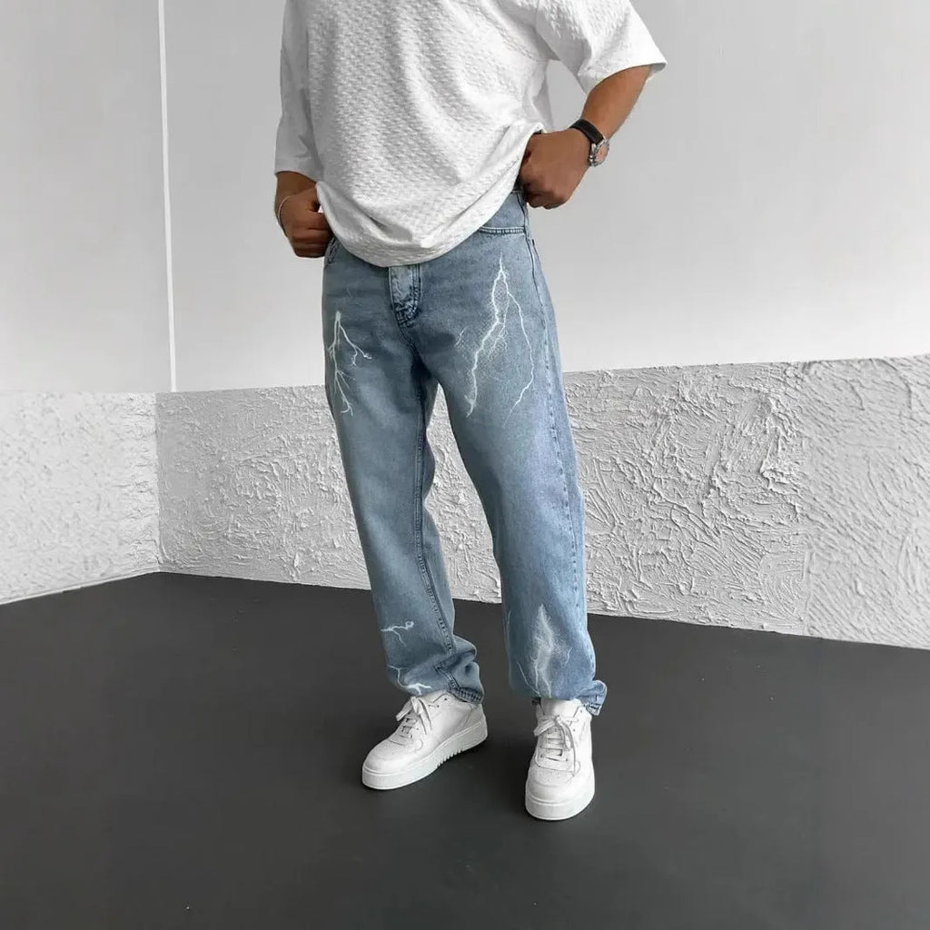Men's blue straight-leg jeans with loose wide-leg fit and mid-rise waist