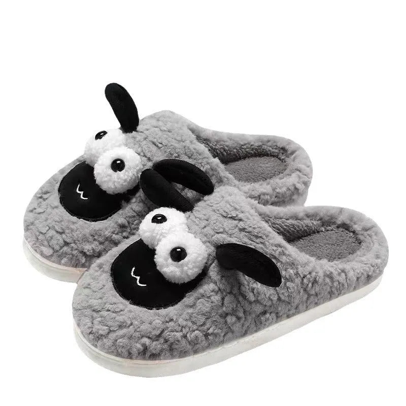 Brown lamb thermal cotton slip-on slippers with a stitched PVC sole on a wooden floor.