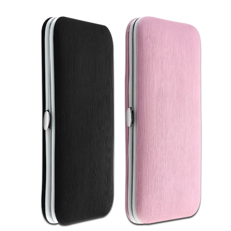 Pink 15-piece stainless steel manicure tool set in compact case measuring 15.5 by 8.2 by 1.3 cm