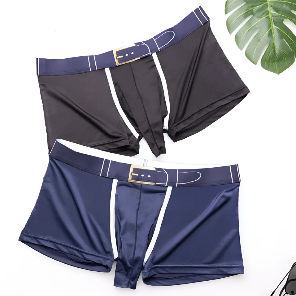 Men's solid colour ice silk boxer shorts on a grey background, showing the mid waist design and lightweight fabric texture.
