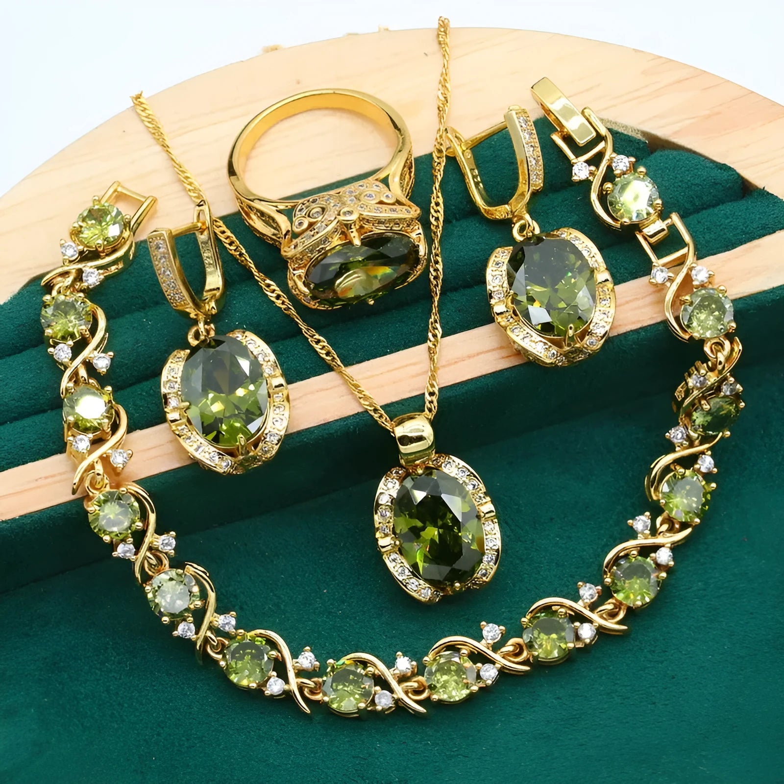 Complete zircon jewellery suit with necklace, earrings, and ring on snake bones chain in olive green colour